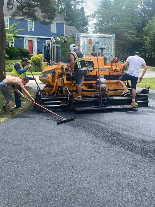Paving crew with equipment
